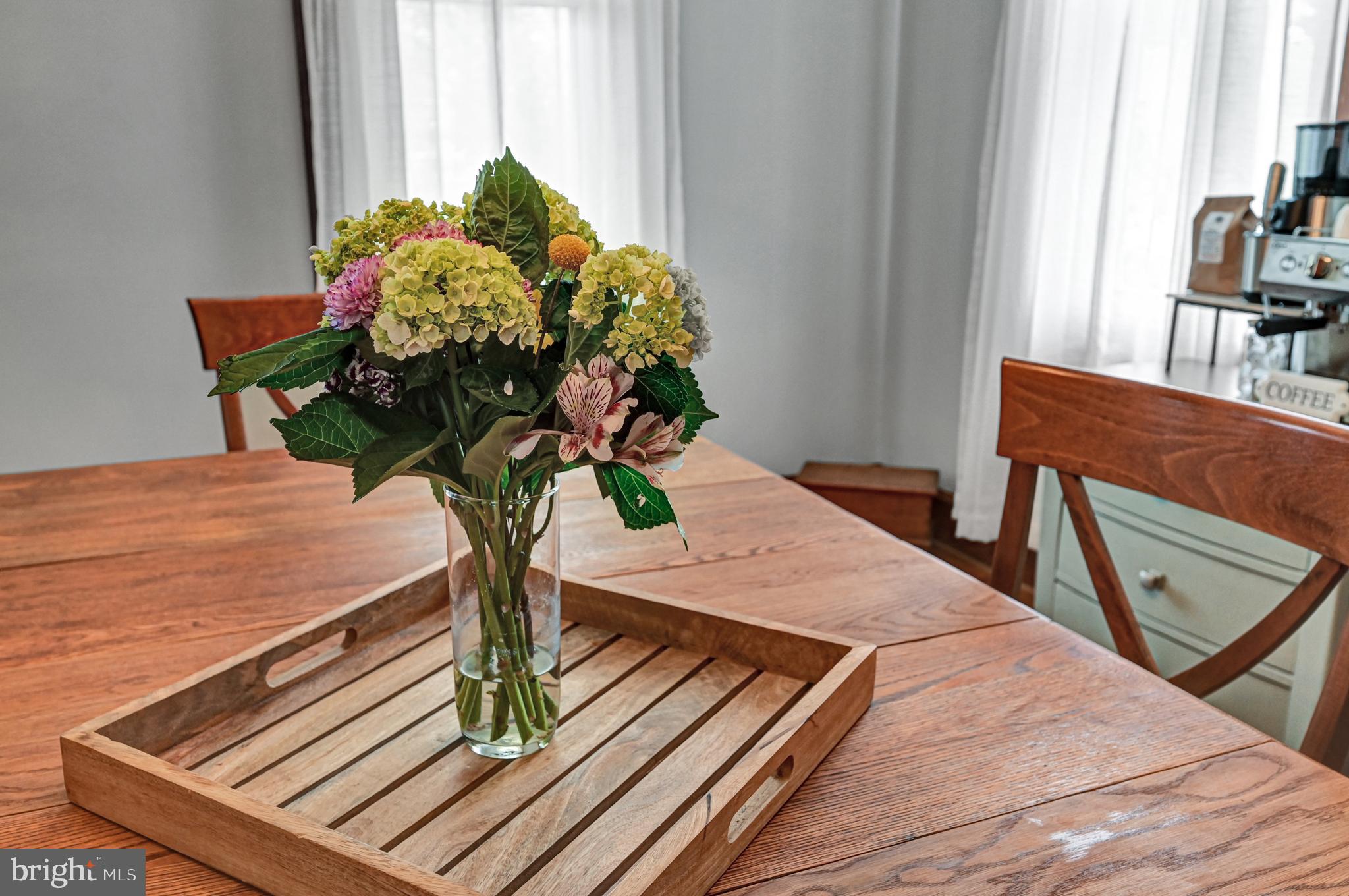 4207 Beckleysville Road Hampstead, MD 21074 - Photo 12 of 68 a vase of flowers sitting on a table