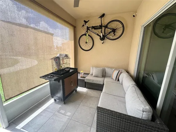 a living room with furniture and a window