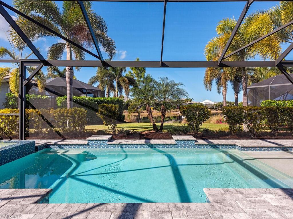 6399 Warwick Avenue Naples, FL 34113 - Photo 14 of 30 a view of a house with a yard