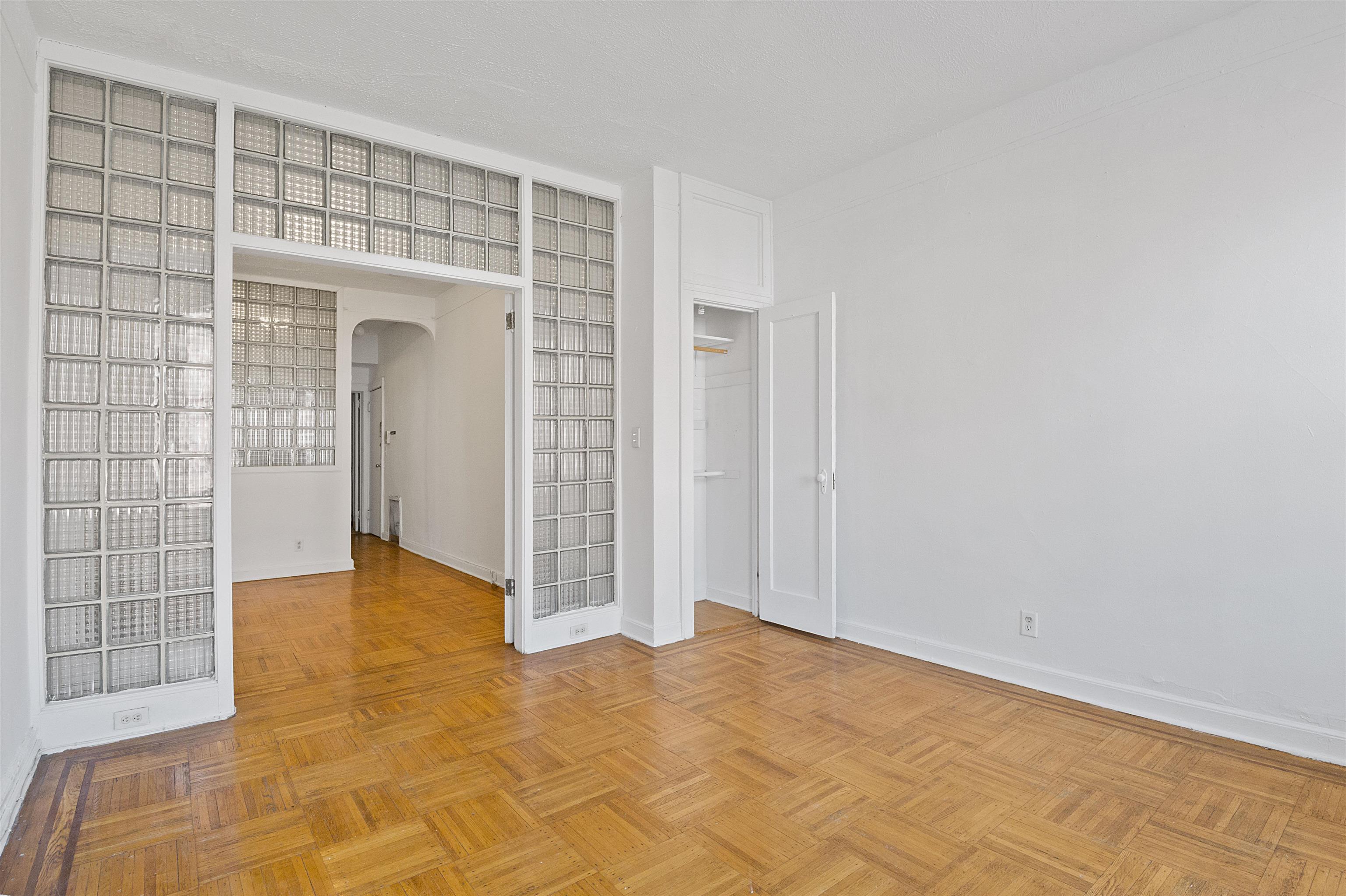 410 Washington Street, Unit 5 Hoboken, NJ 07030 - Photo 11 of 15 an empty room with a bathroom