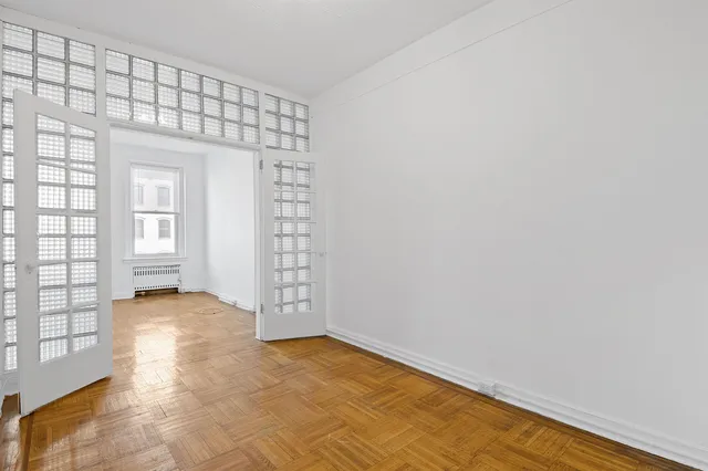 an empty room with windows