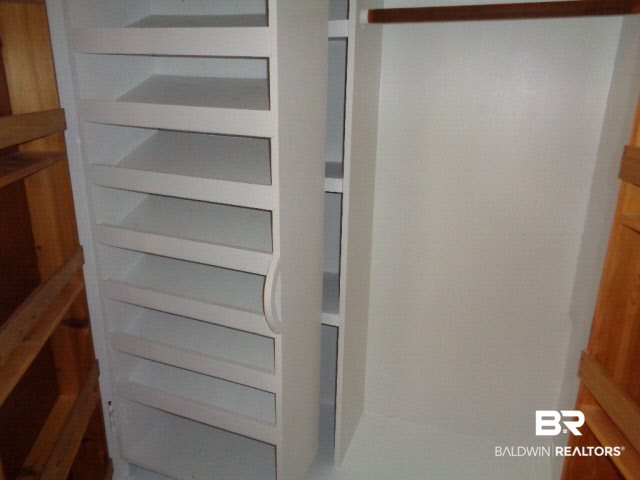28202 Vargo Lane Elberta, AL 36530 - Photo 21 of 45 Has swing shelving.