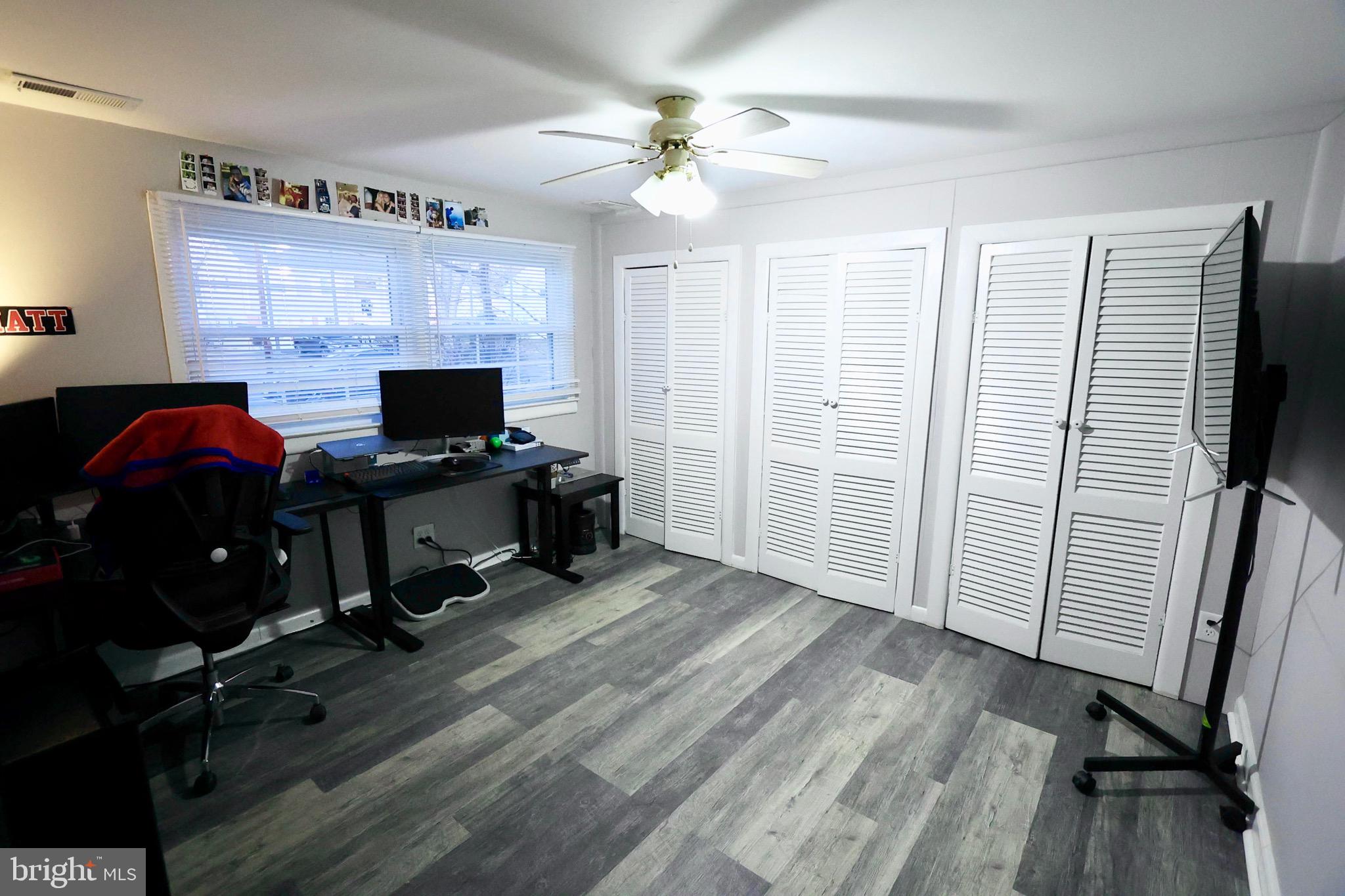 1036 Surrey Road Somerdale, NJ 08083 - Photo 17 of 23 a view of a workspace with furniture and a window
