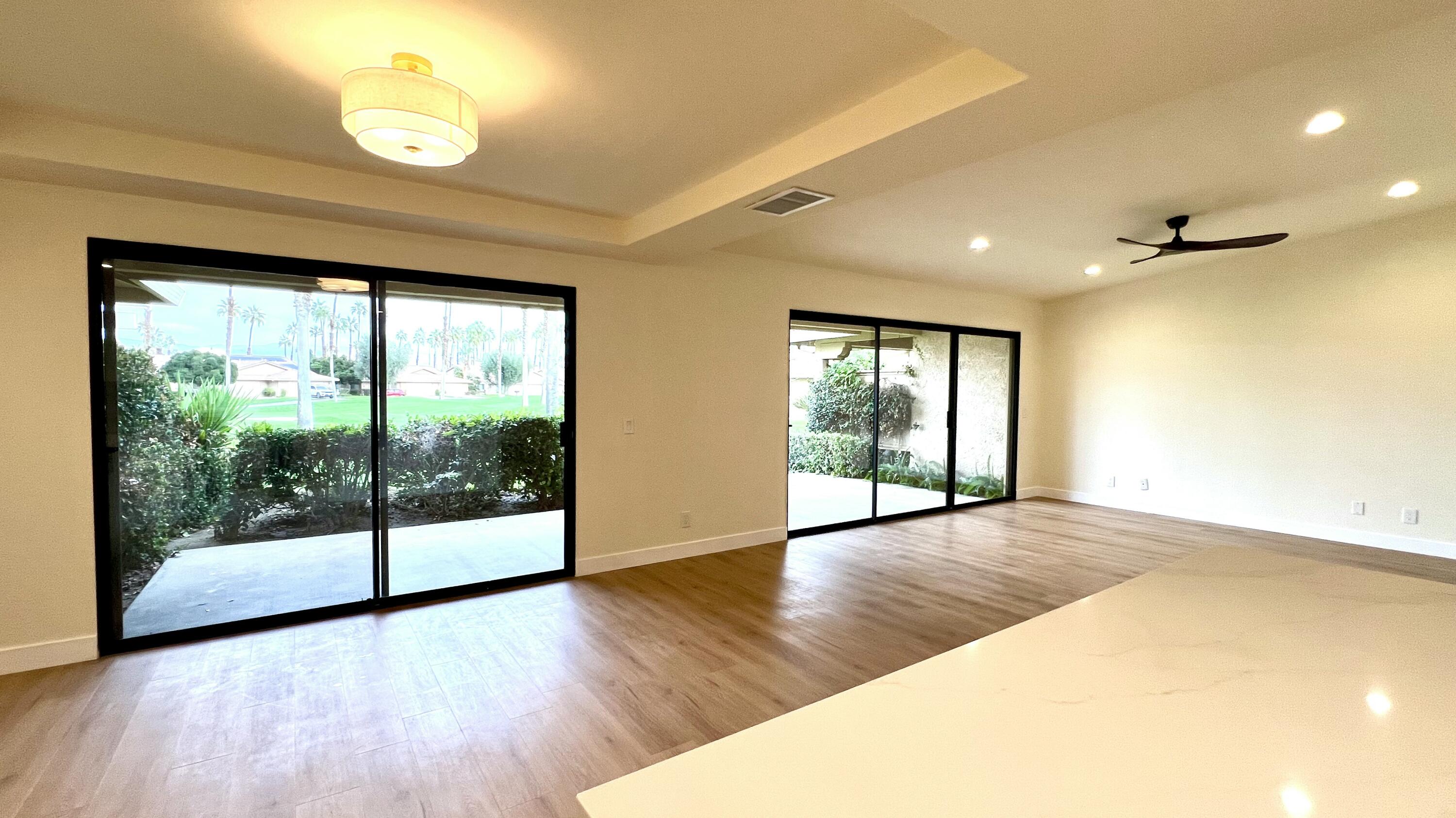 54 Maximo Way Palm Desert, CA 92260 - Photo 5 of 27 dining area/living room