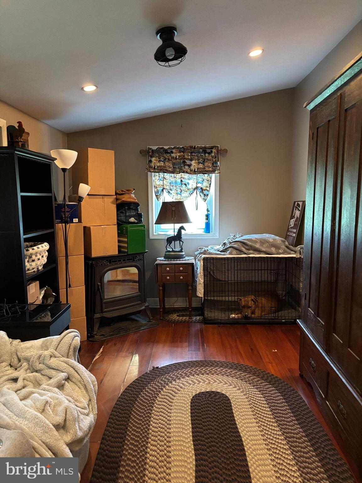 290 Woods Road Abbottstown, PA 17301 - Photo 13 of 49 a bedroom with furniture and a flat screen tv