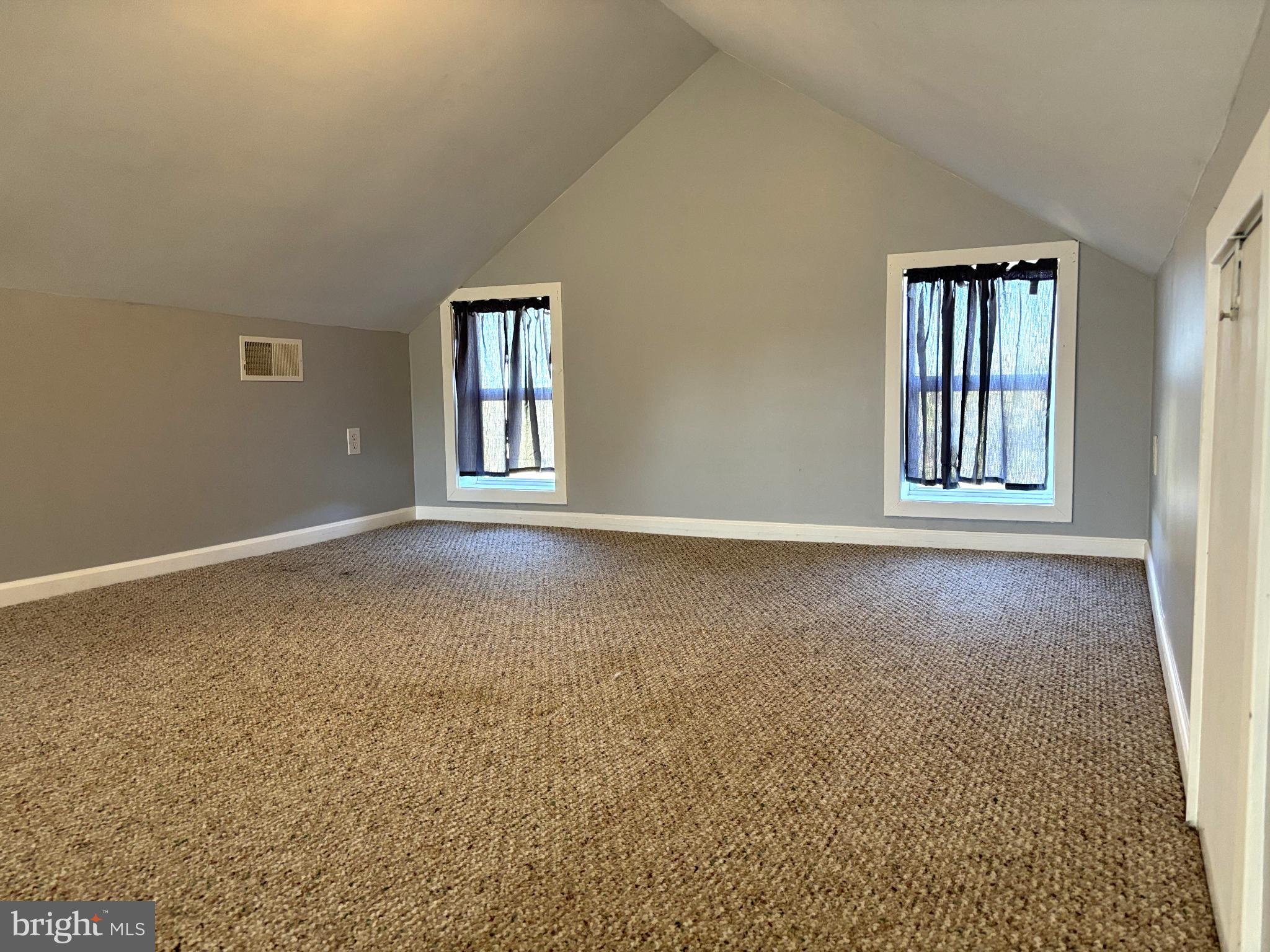 290 Woods Road Abbottstown, PA 17301 - Photo 26 of 49 an empty room with windows and closet