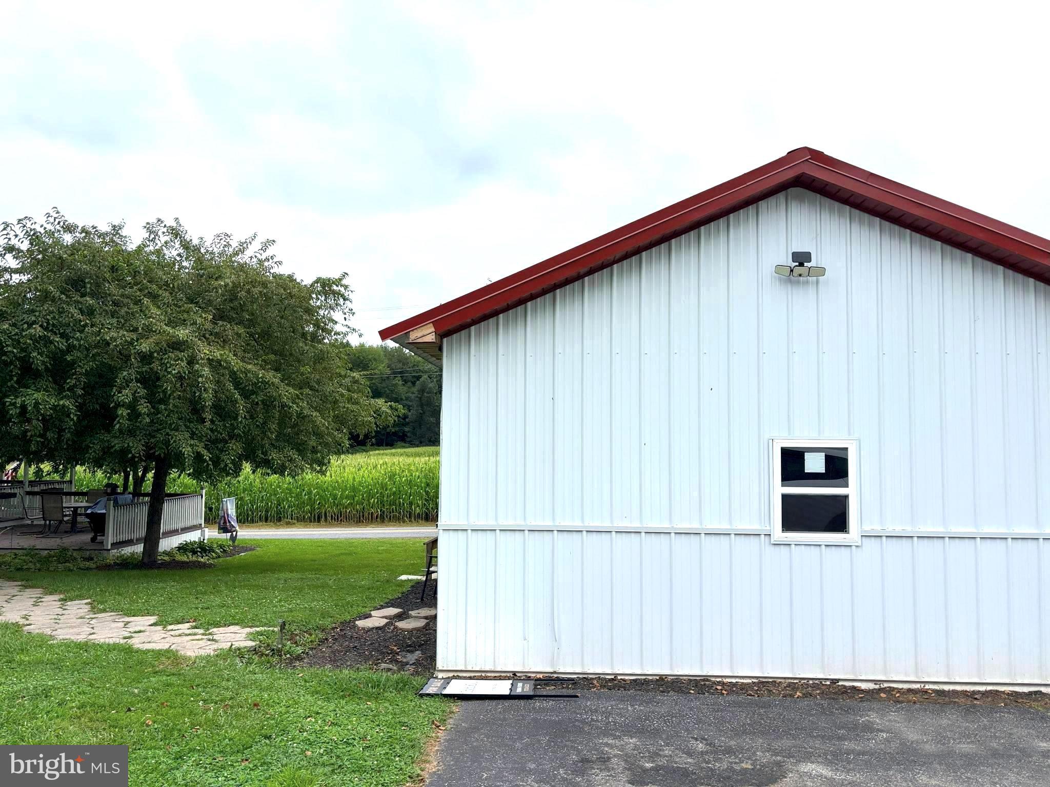 290 Woods Road Abbottstown, PA 17301 - Photo 31 of 49 a front view of a house with garden