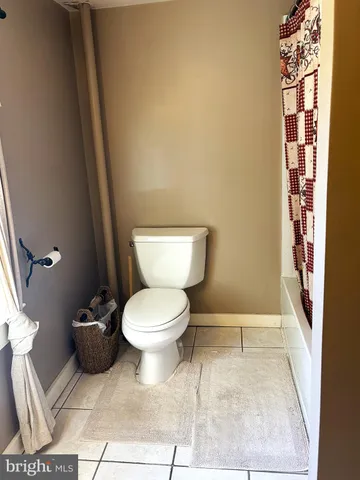 a bathroom with a sink a mirror and a shower