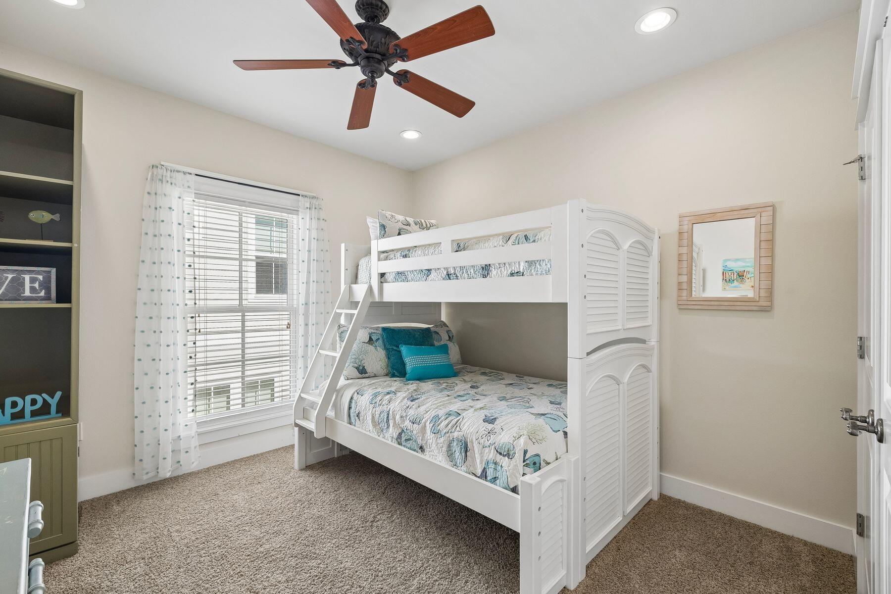 39 Willow Mist Road Inlet Beach, FL 32461 - Photo 22 of 41 a bedroom with a bed and a window