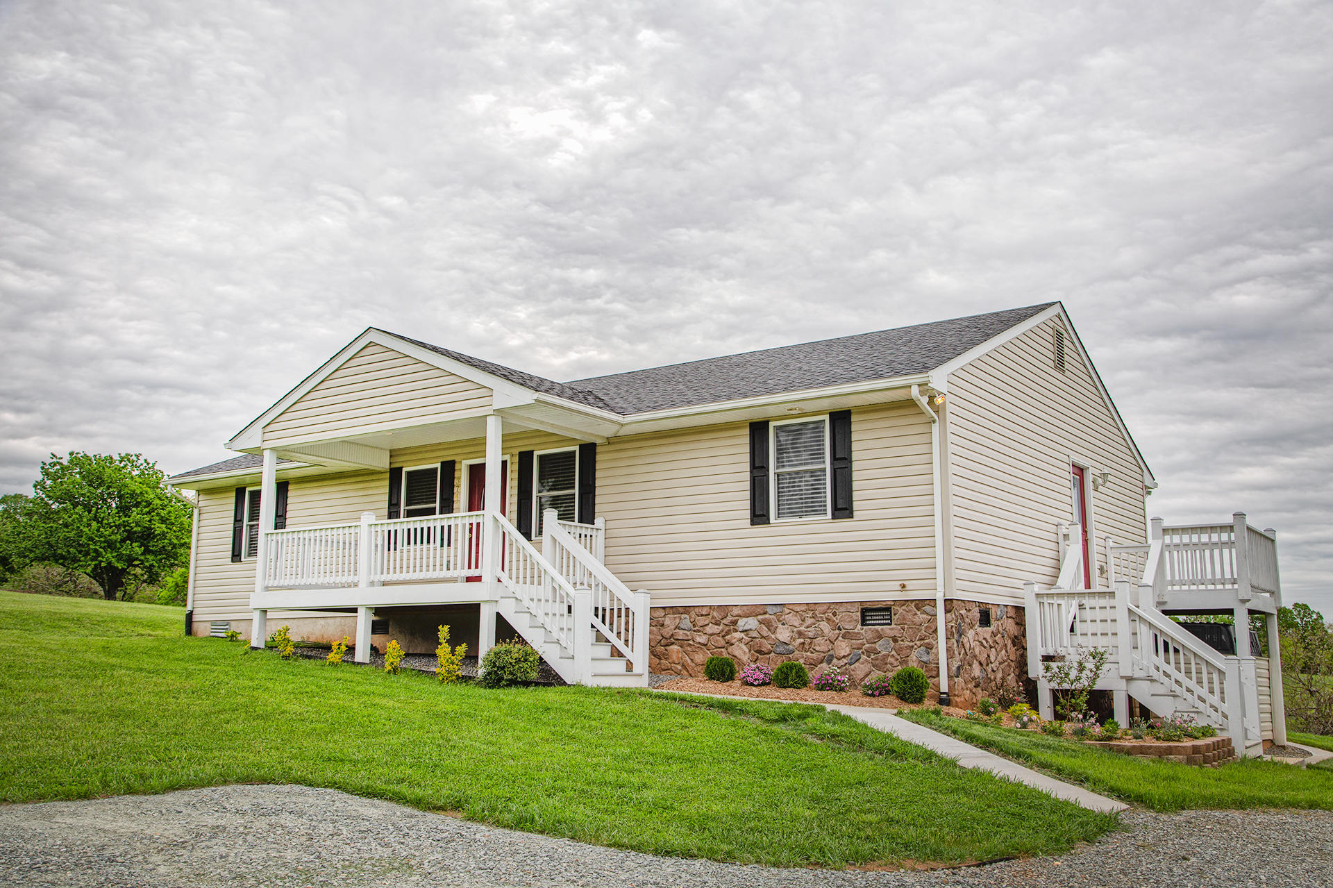 3746 Horseshoe Bend Road Goodview, VA 24095 - Photo 32 of 35 a front view of house with yard and green space