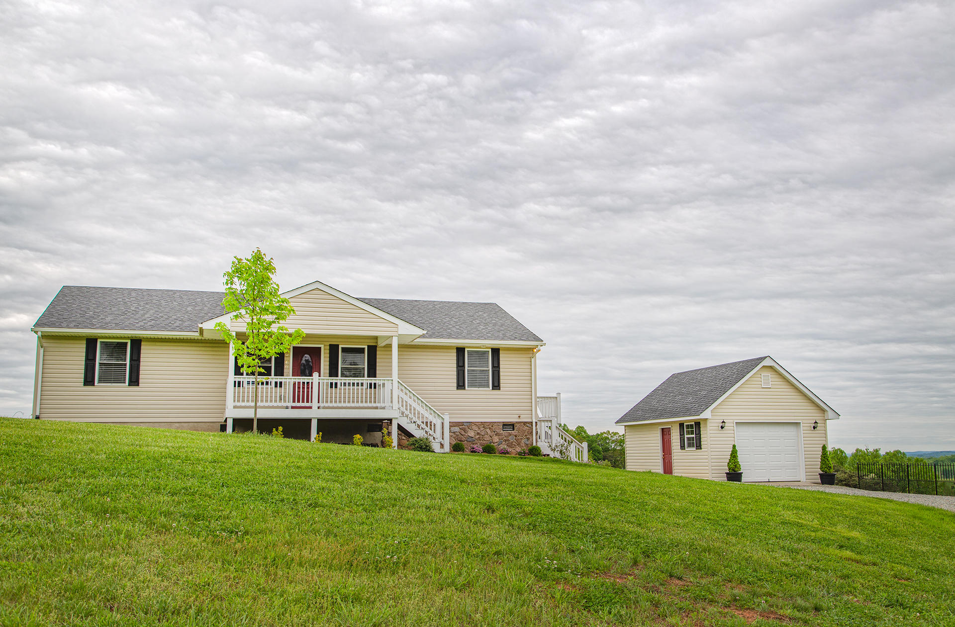 3746 Horseshoe Bend Road Goodview, VA 24095 - Photo 33 of 35 front view of a house with a yard