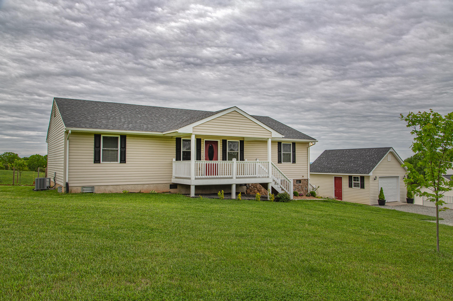 3746 Horseshoe Bend Road Goodview, VA 24095 - Photo 34 of 35 a front view of a house with a yard