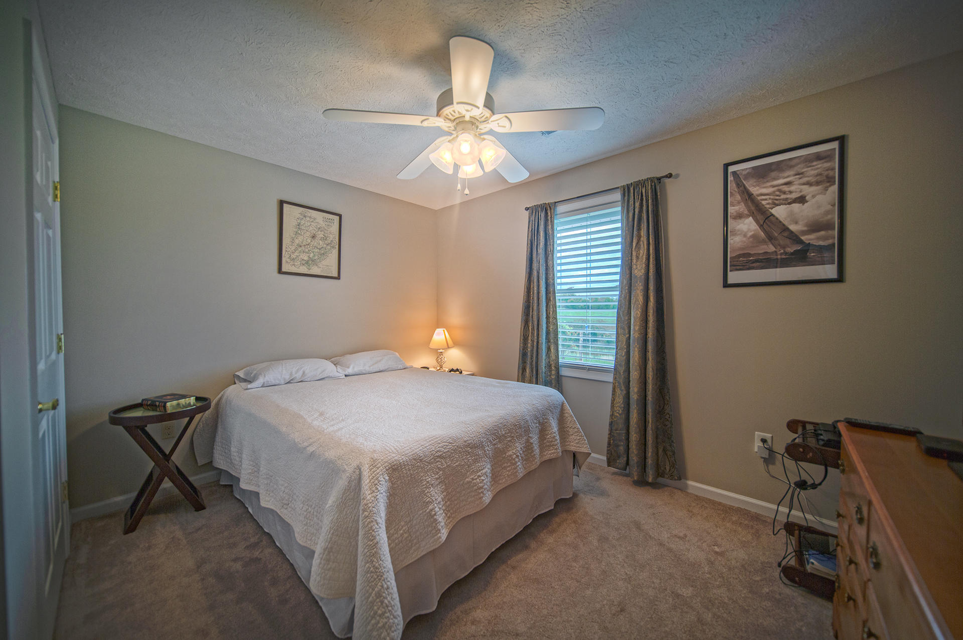 3746 Horseshoe Bend Road Goodview, VA 24095 - Photo 5 of 35 a bedroom with a bed and a table