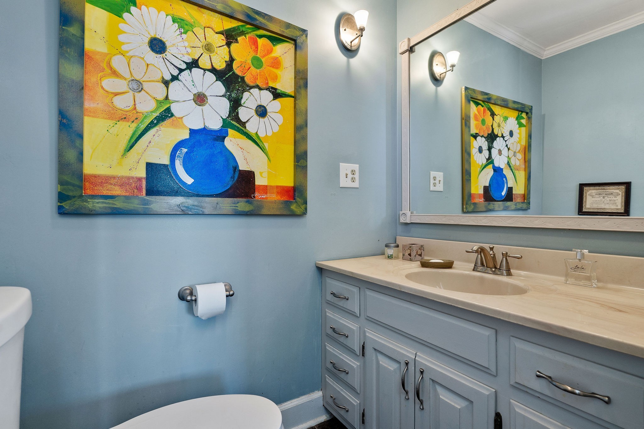 307 West Main Street Smithville, TN 37166 - Photo 30 of 58 a bathroom with a sink a mirror and painting on the wall