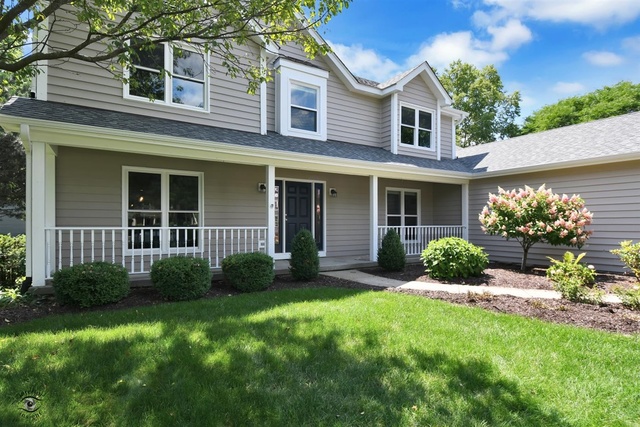 1536 Carlyle Road Naperville, IL 60564 - Photo 2 of 65 a view of a house with a yard and plants