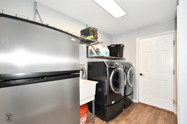 1536 Carlyle Road Naperville, IL 60564 - Photo 19 of 65 a utility room with dryer and washer