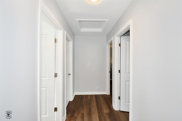 1536 Carlyle Road Naperville, IL 60564 - Photo 34 of 65 a view of a hallway with wooden floor