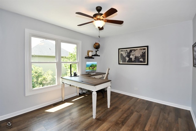 1536 Carlyle Road Naperville, IL 60564 - Photo 37 of 65 a view of a workspace with furniture window and wooden floor