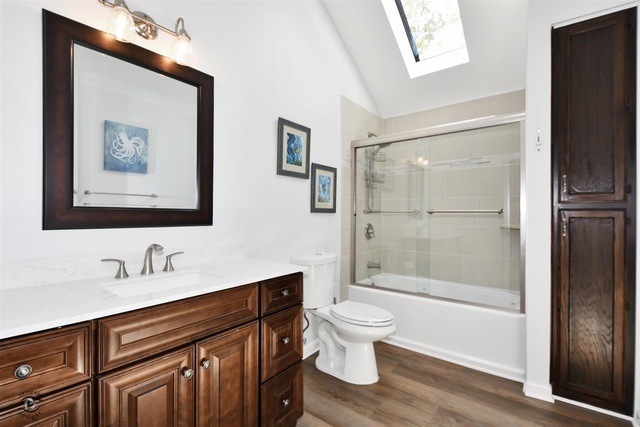 1536 Carlyle Road Naperville, IL 60564 - Photo 41 of 65 a bathroom with a sink toilet and shower