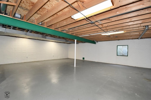 1536 Carlyle Road Naperville, IL 60564 - Photo 42 of 65 a view of a room with wooden walls