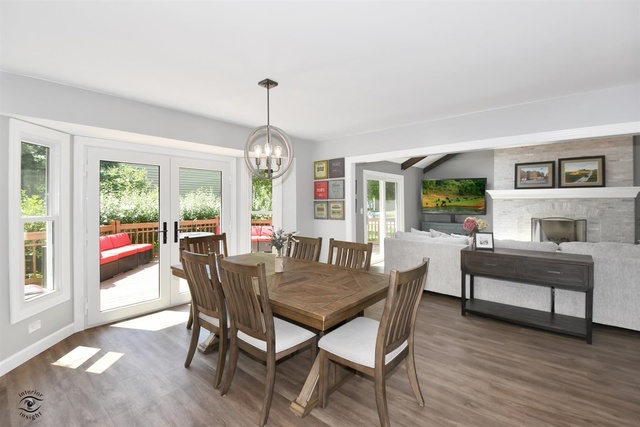 1536 Carlyle Road Naperville, IL 60564 - Photo 10 of 65 a view of a dining room with furniture window and wooden floor