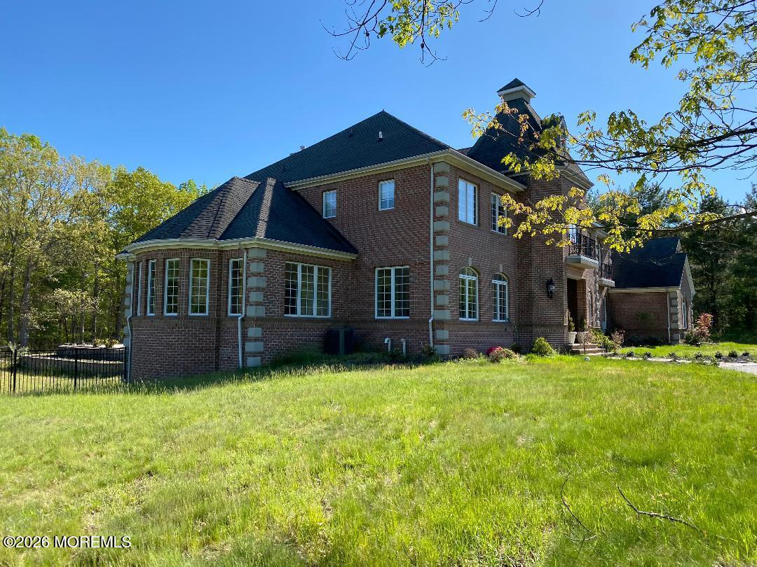 97 Stone Hill Road Colts Neck, NJ 07722 - Photo 3 of 5 SIDE