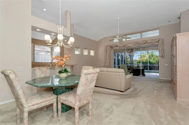 a view of a dining room kitchen and a window