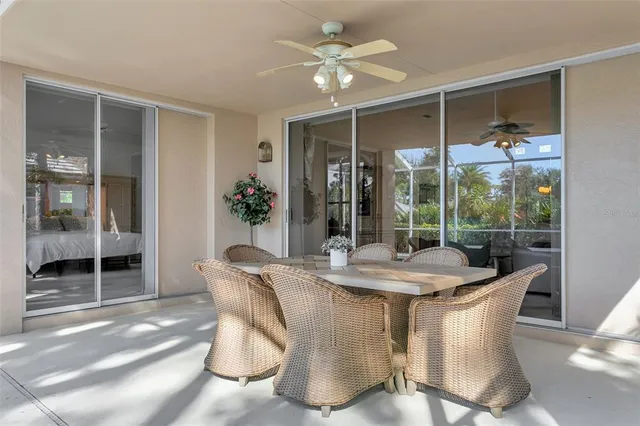 a view of a swimming pool with a garden in the background