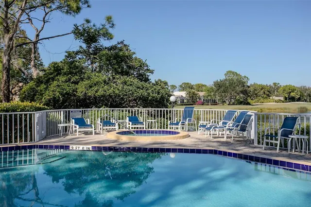 a sign that is in front of flowers