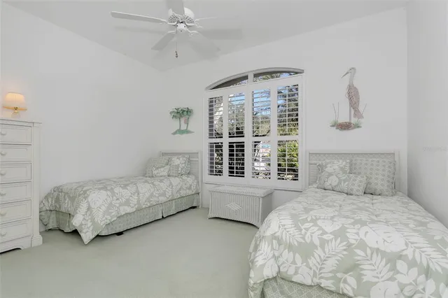 a bedroom with a bed and a cabinets