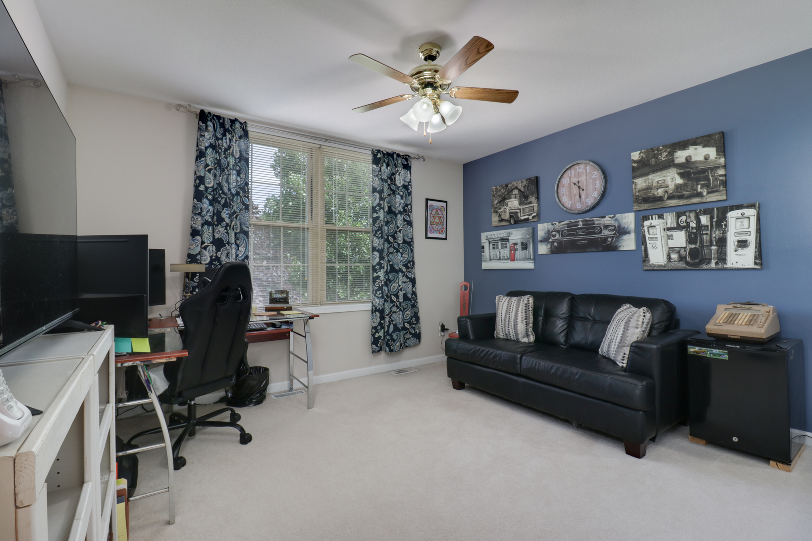 1099 Balsam Road Normal, IL 61761 - Photo 25 of 45 a living room with furniture and a flat screen tv