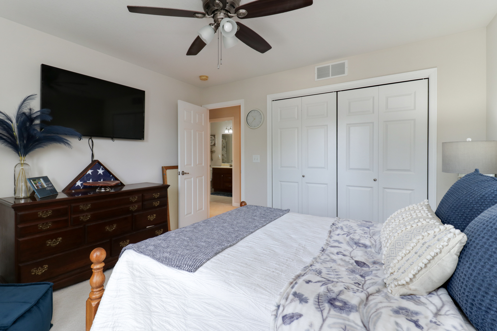 1099 Balsam Road Normal, IL 61761 - Photo 28 of 45 a bedroom with a bed and a flat screen tv