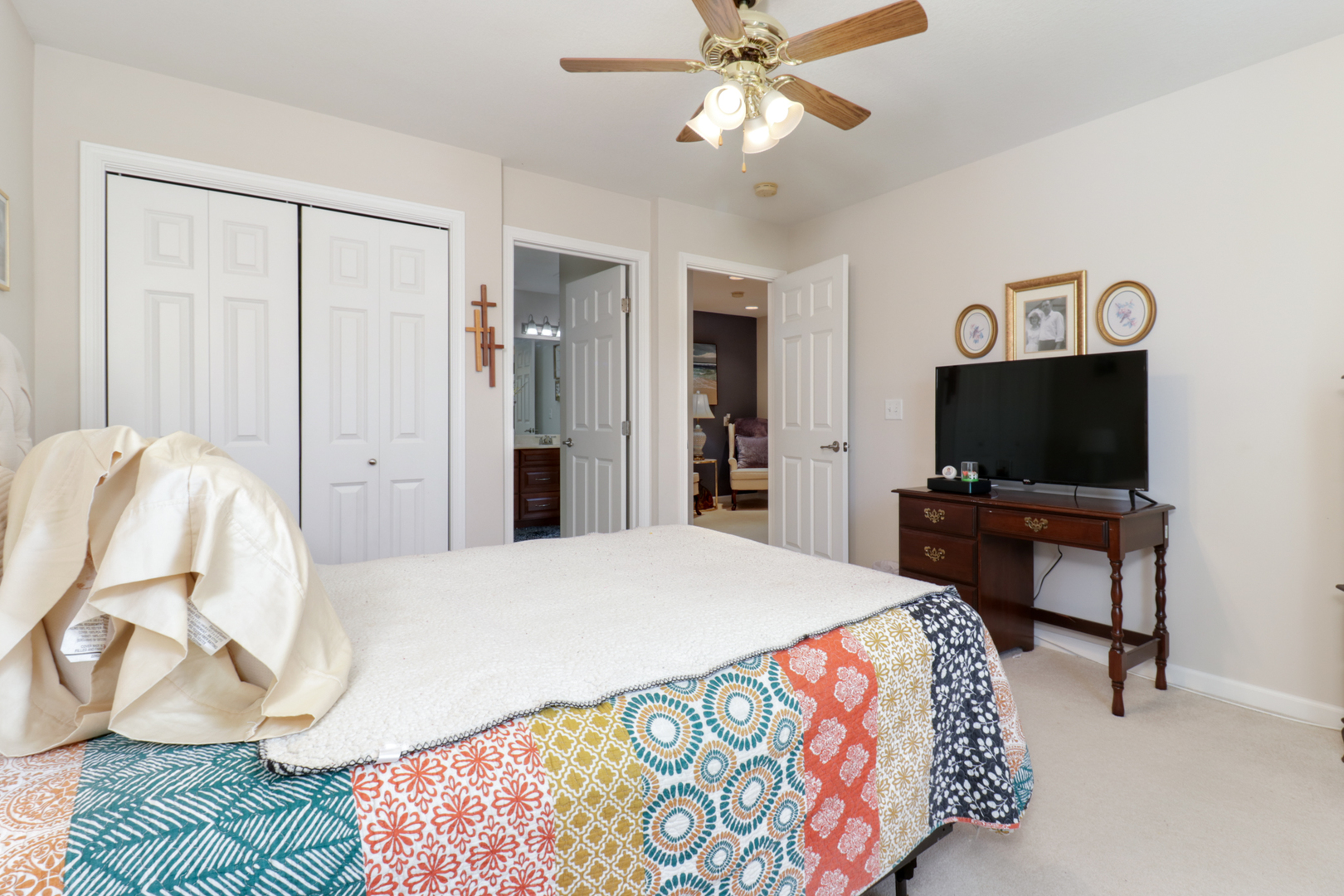1099 Balsam Road Normal, IL 61761 - Photo 30 of 45 a bedroom with a bed and a flat screen tv