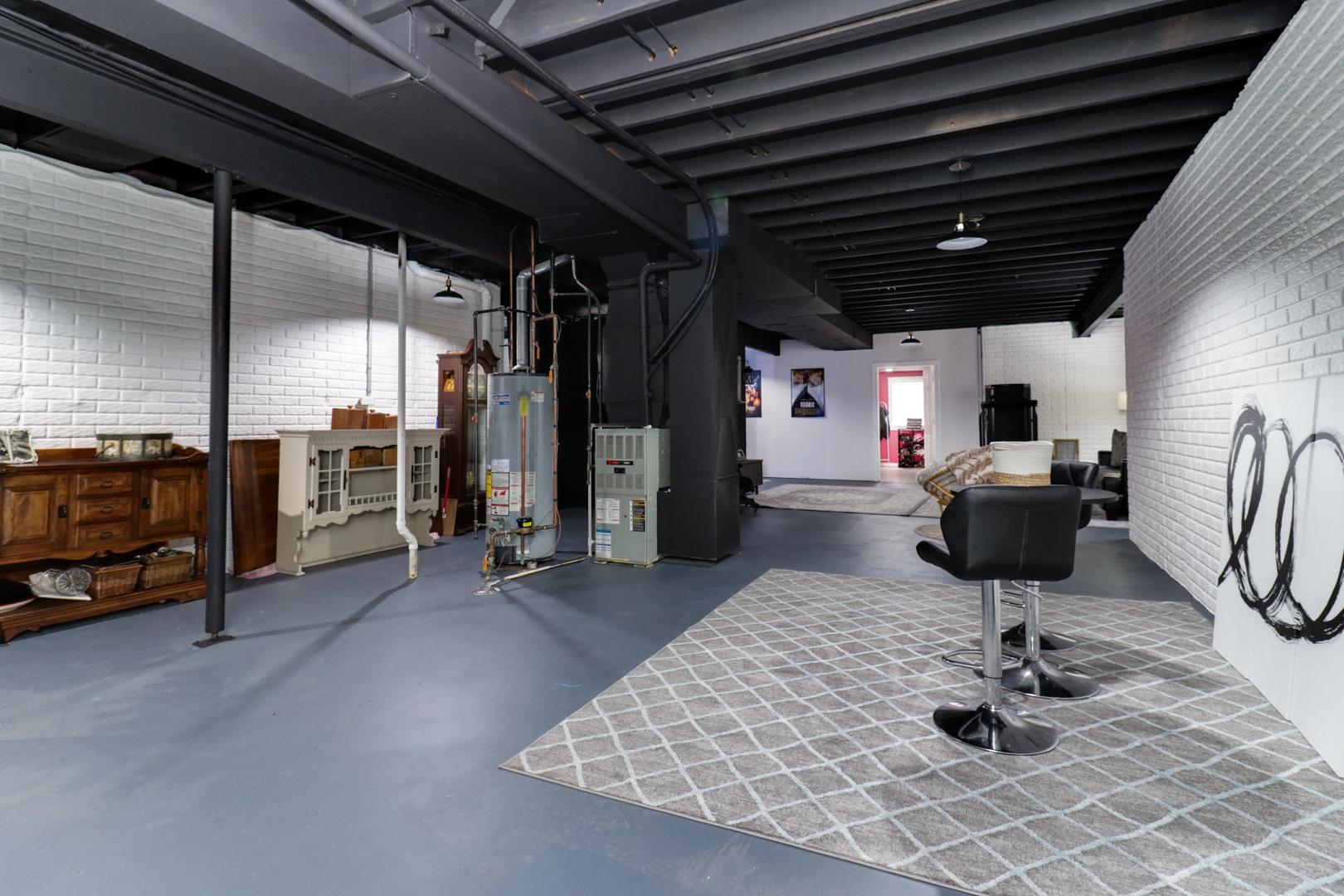 1099 Balsam Road Normal, IL 61761 - Photo 33 of 45 a room with lots of furniture and gym equipment
