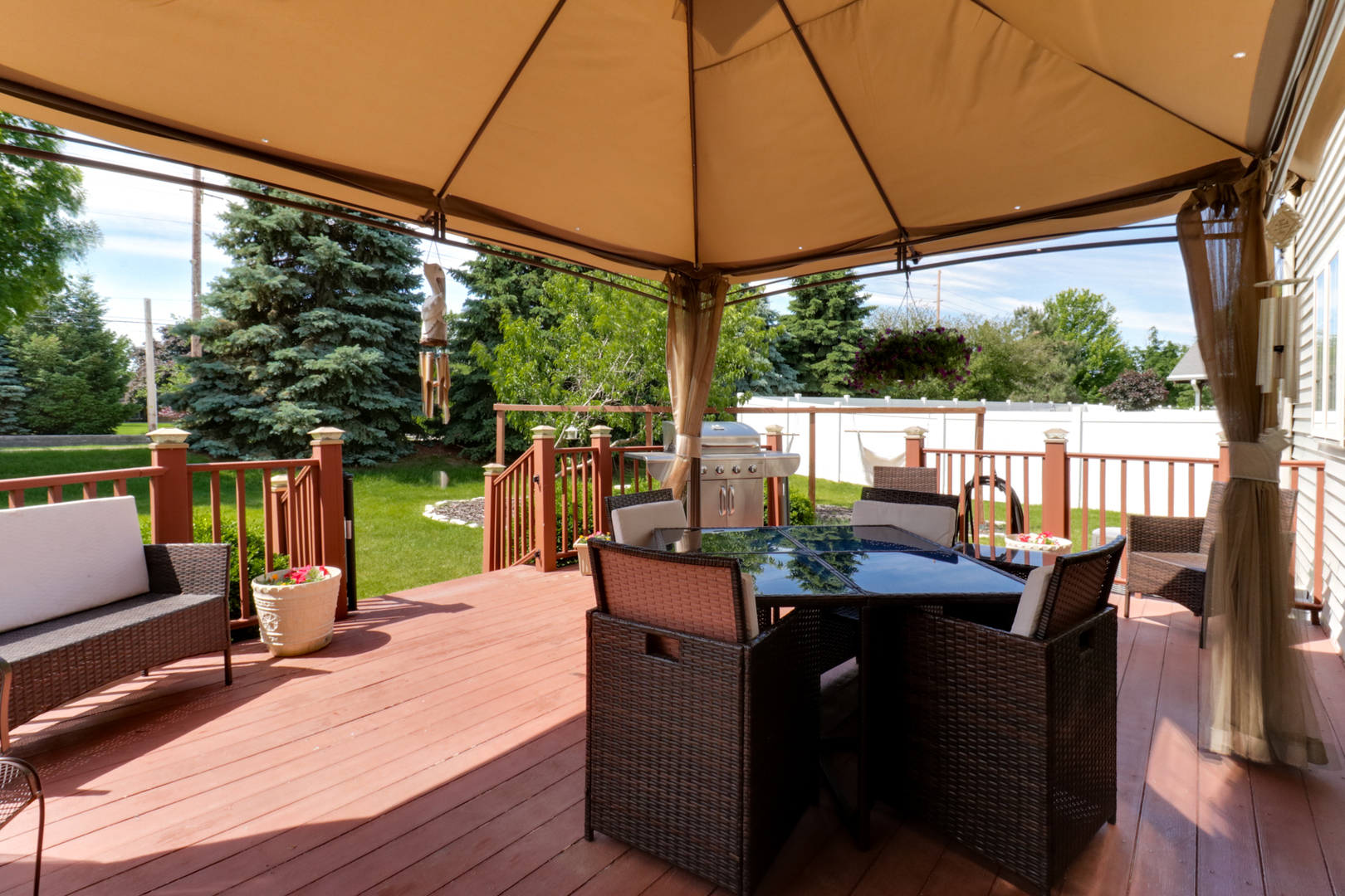 1099 Balsam Road Normal, IL 61761 - Photo 37 of 45 a view of a patio with couches chairs under an umbrella