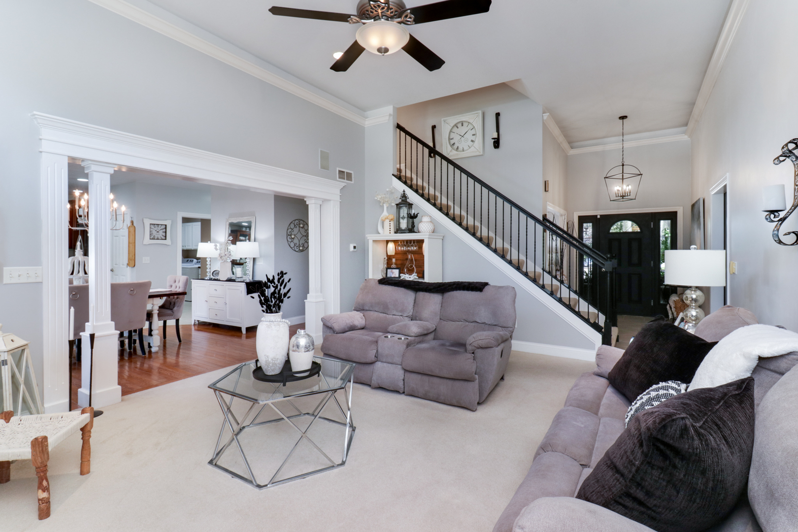 1099 Balsam Road Normal, IL 61761 - Photo 5 of 45 a living room with furniture or dining table and a chandelier