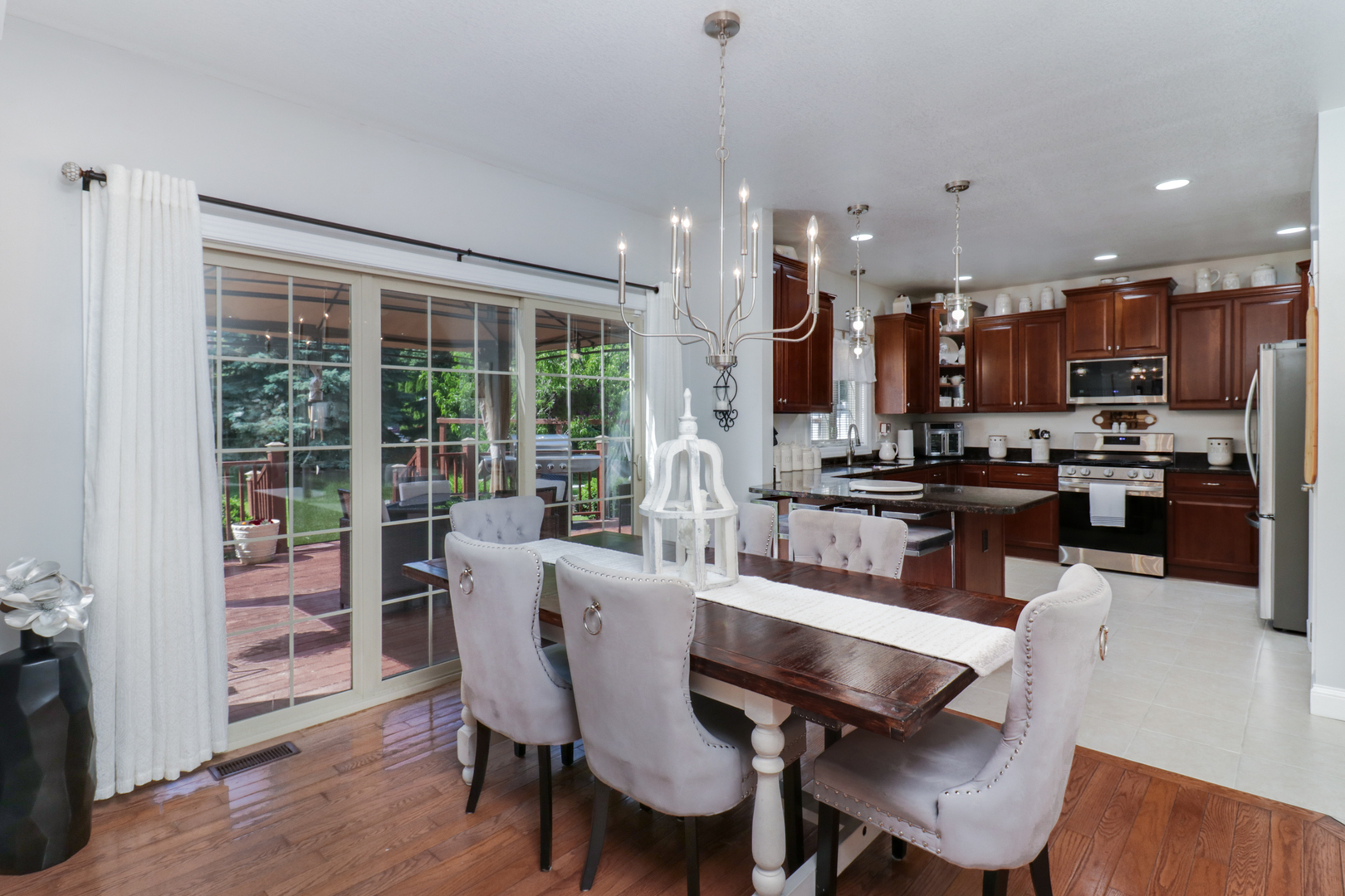 1099 Balsam Road Normal, IL 61761 - Photo 6 of 45 a view of a dining room with furniture window and wooden floor