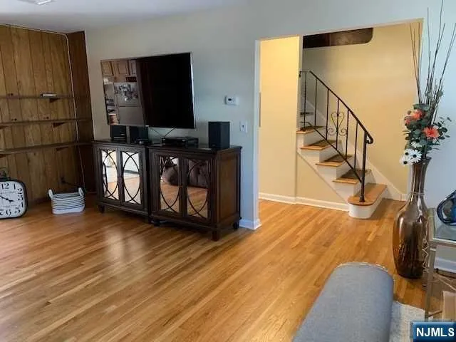 a view of entryway with wooden floor