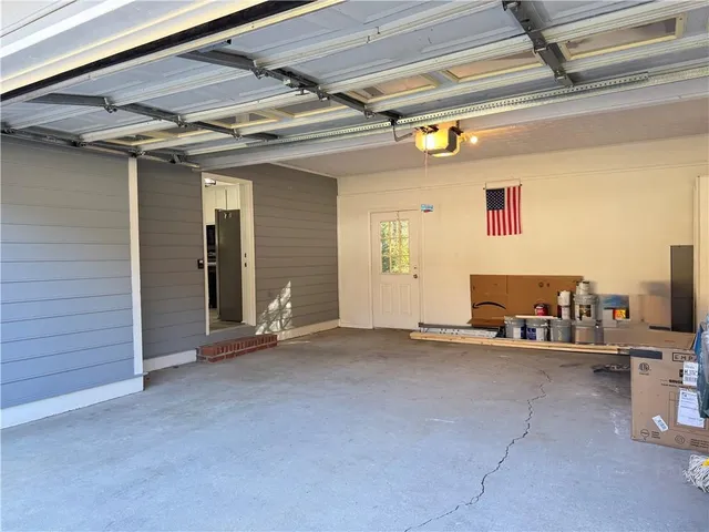a view of balcony with wooden floor and fence