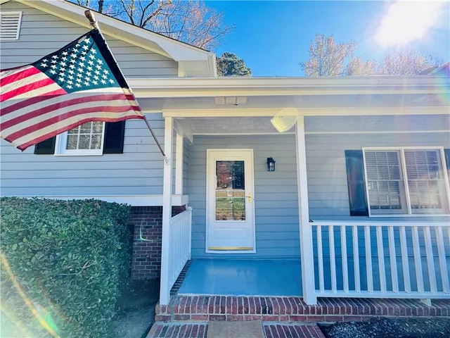 a view of a house with a porch
