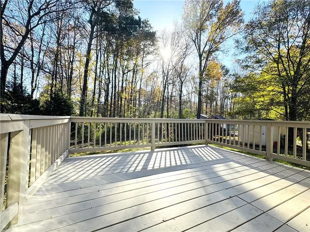 a view of backyard with deck