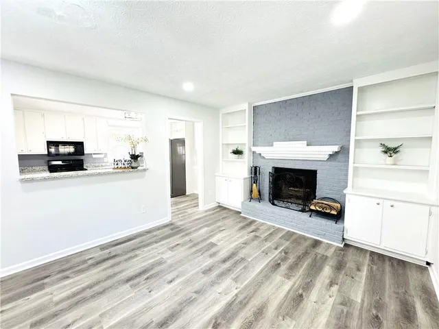 a view of a livingroom with a fireplace