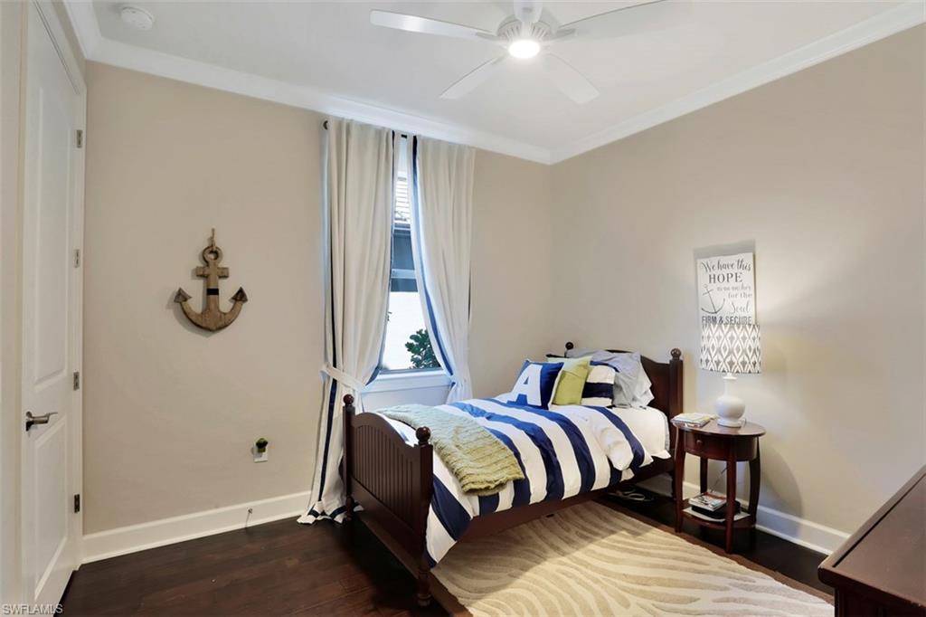 7005 Live Oak Drive Naples, FL 34114 - Photo 16 of 24 a bedroom with a bed and a window