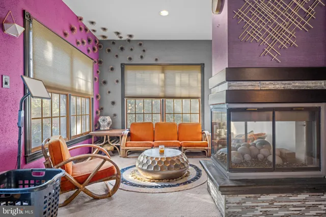 a bedroom with a bed and ceiling fan