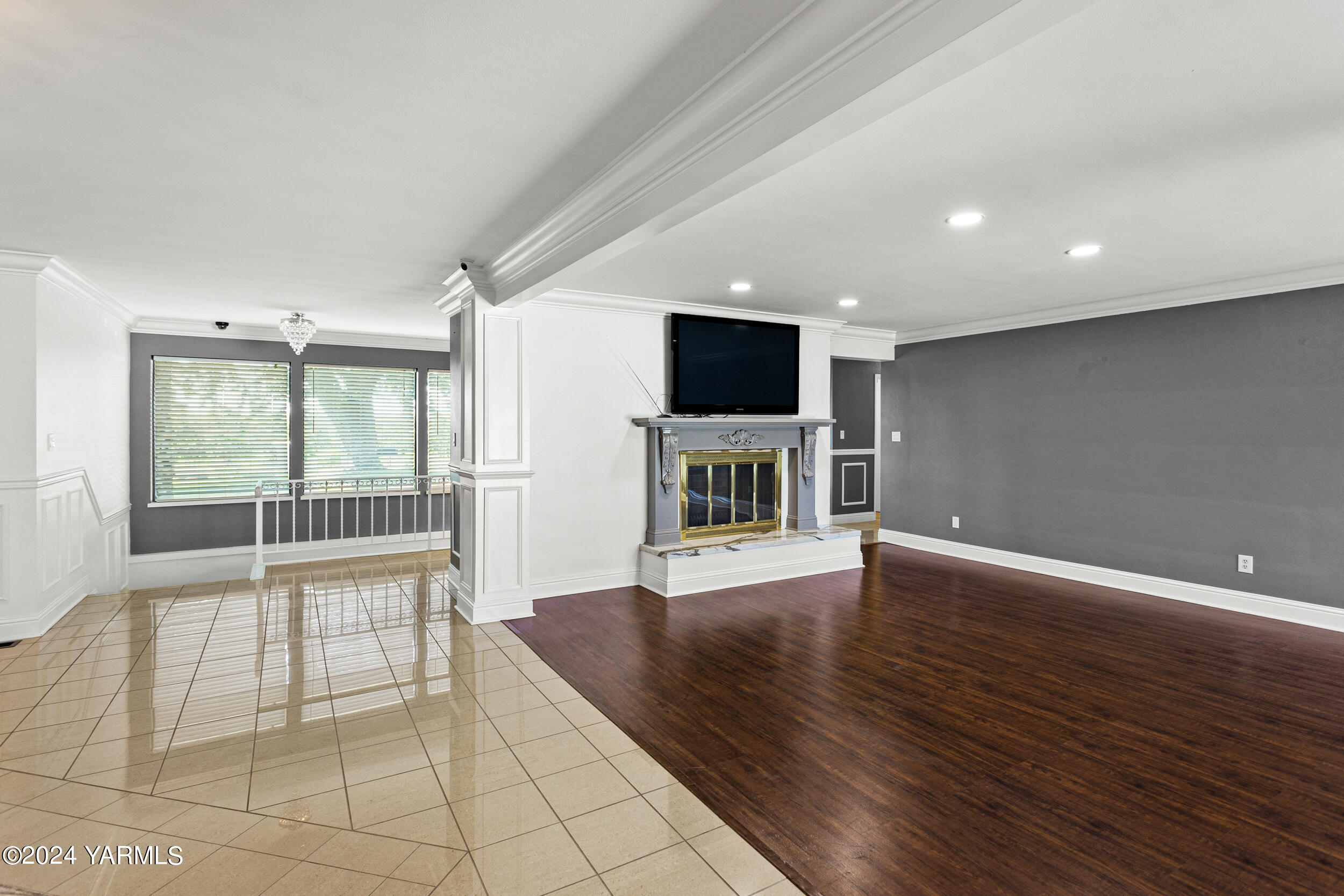 531 McDonald Road Toppenish, WA 98948 - Photo 12 of 78 a view of a livingroom with furniture wooden floor and a fireplace