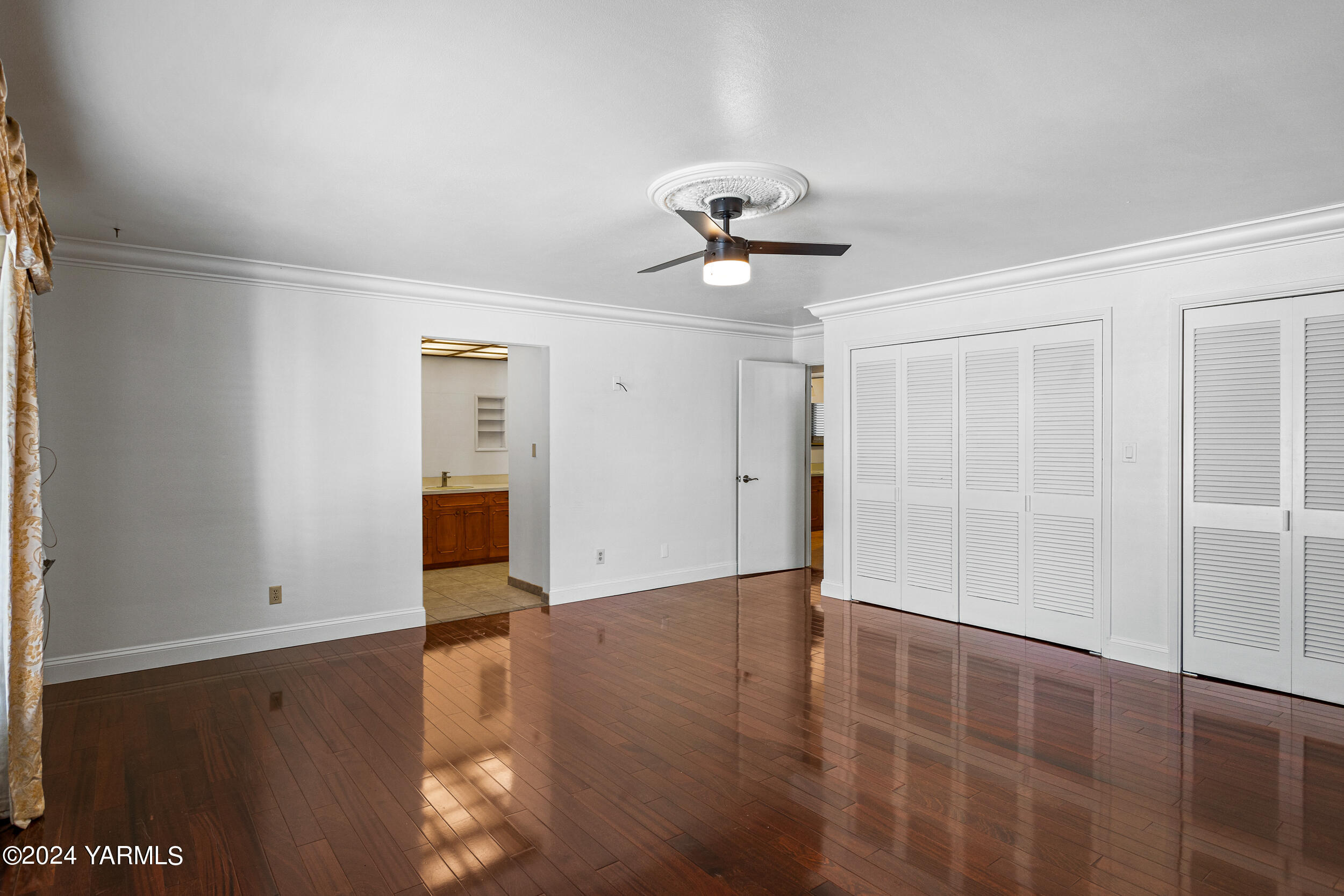 531 McDonald Road Toppenish, WA 98948 - Photo 31 of 78 a view of an empty room with wooden floor