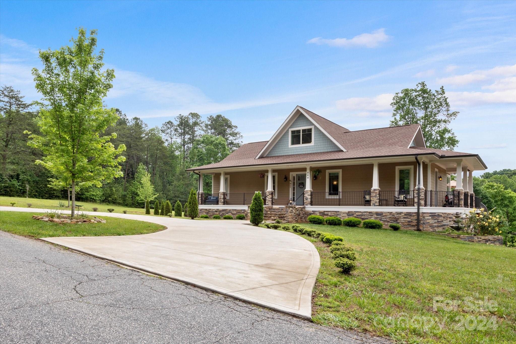 464 Hooper Creek Road Tryon, NC 28782 - Photo 1 of 24 a front view of a house with a yard