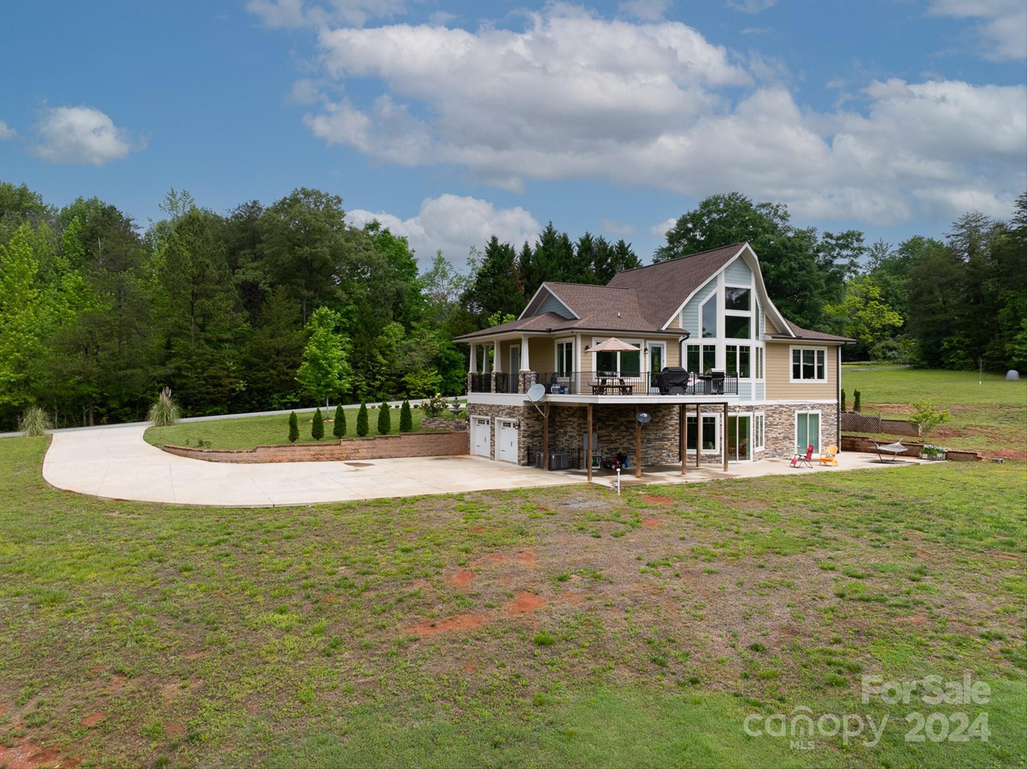 464 Hooper Creek Road Tryon, NC 28782 - Photo 21 of 24 a view of a house with swimming pool