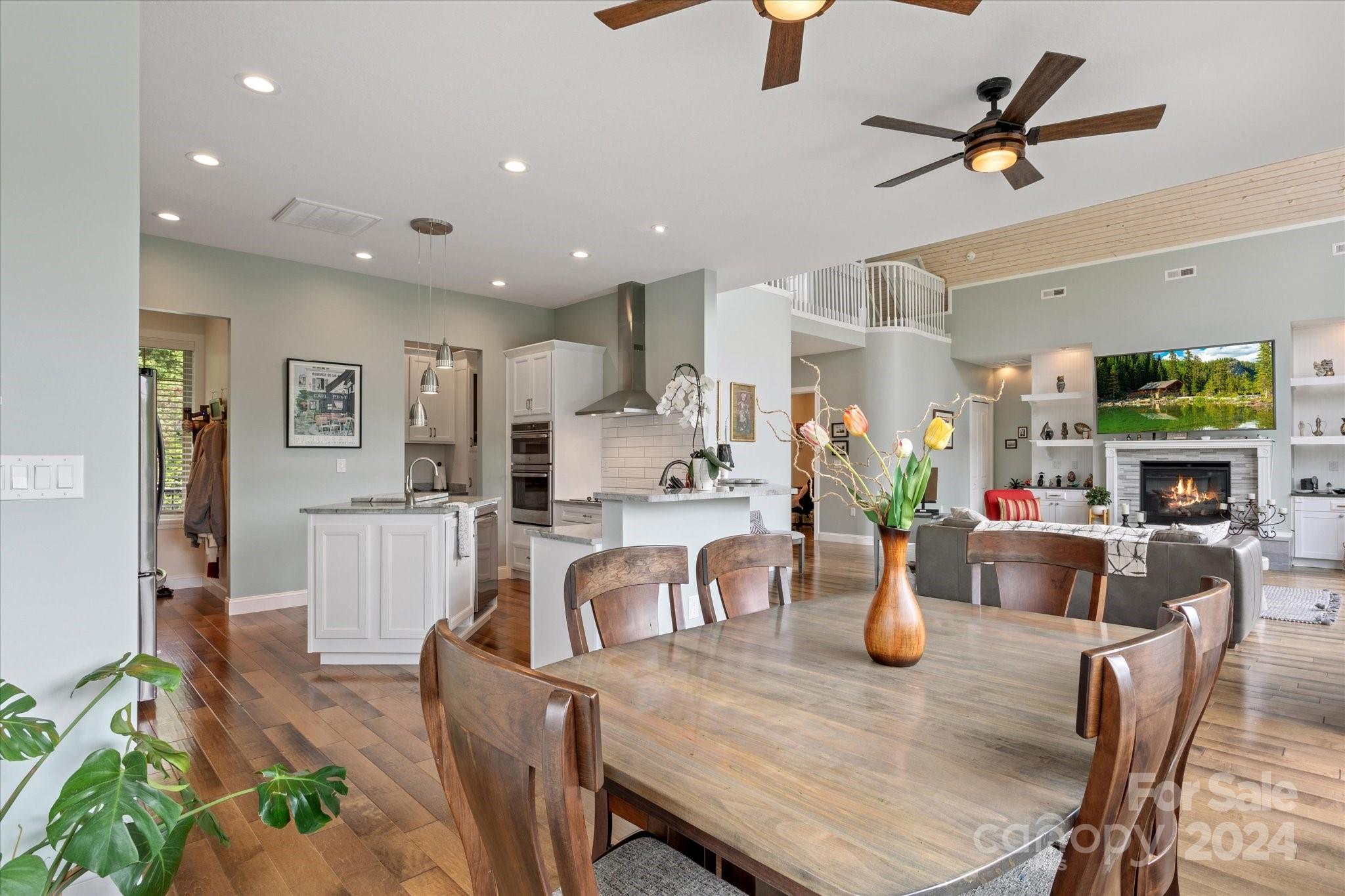 464 Hooper Creek Road Tryon, NC 28782 - Photo 6 of 24 a view of a dining room with furniture