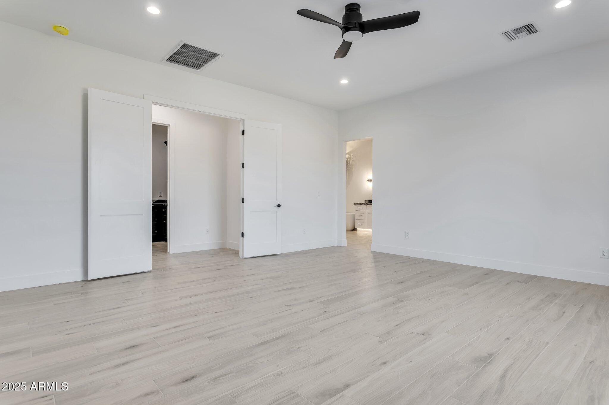 1602 East Cloud Road Phoenix, AZ 85086 - Photo 18 of 45 wooden floor in an empty room